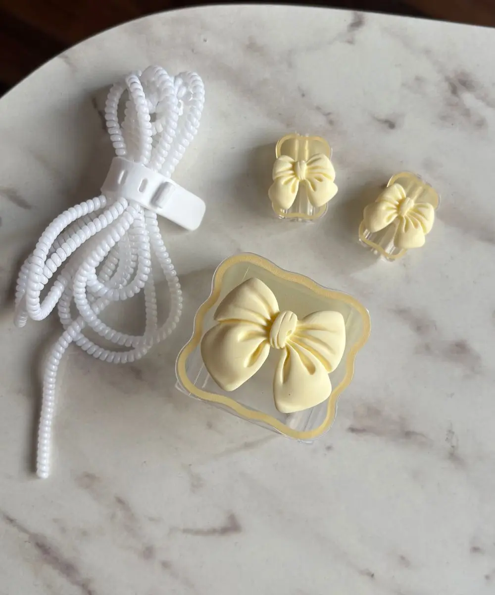 protector de cargador iphone lazo amarillo